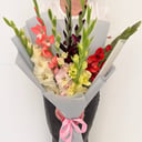 Букет из разноцветных гладиолусов 7 шт.