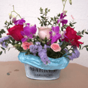 Корзина с цветами «Композиция из роз, орхидеи и парвиволия»