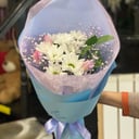 Букет «Кукси» из тюльпанов и гипсофил