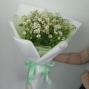 Букет ромашек в упаковке