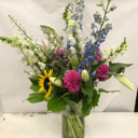 Букет «Фейерверк эмоций» из экзотических цветов и подсолнухов