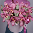 Орхидея в шляпной коробочке