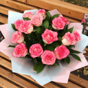 Букет «15 роз джумилия в дизайнерской пленке»