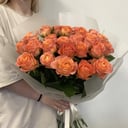 Букет оранжевых роз 25 шт в упаковке