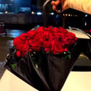 Композиция «Букет красных роз в зонтике»