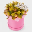 Шляпная коробка с цветами «День солнечного света» из орхидей