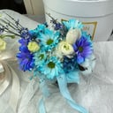 Шляпная коробка с цветами «Композиция Лагуна» из экзотических цветов и тюльпанов